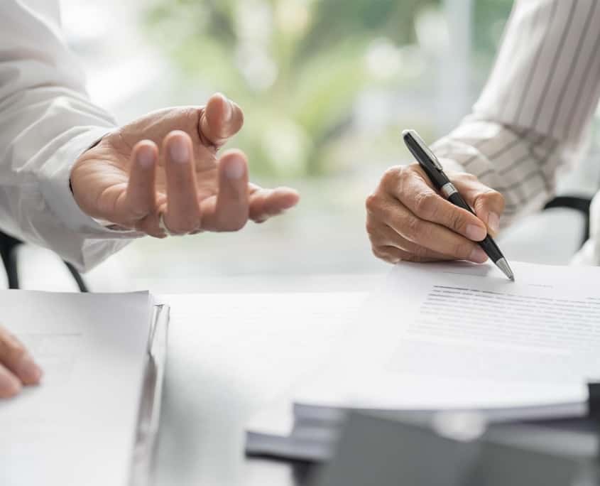 Residential Financing 1Two financial experts looking over documents