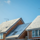 Snow covered new built house roof